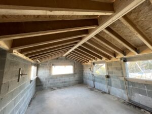 Conception et installation d'une charpente en bois